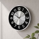 Horloge murale ronde noir et argent effet métal avec grands chiffres pour le salon 30x30x4 cm
