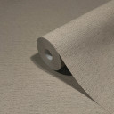 Non-woven tapet i et let meleret look som almindeligt brunt klistertapet