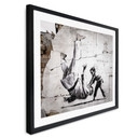 Plakat Banksy'ego w Ukrainie - Mały judoka