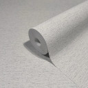 Non-woven tapet i et let meleret look som almindelig grå, beige struktureret