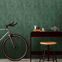 Non-woven tapet med metallic effekt i grønt ensfarvet struktureret tapet design