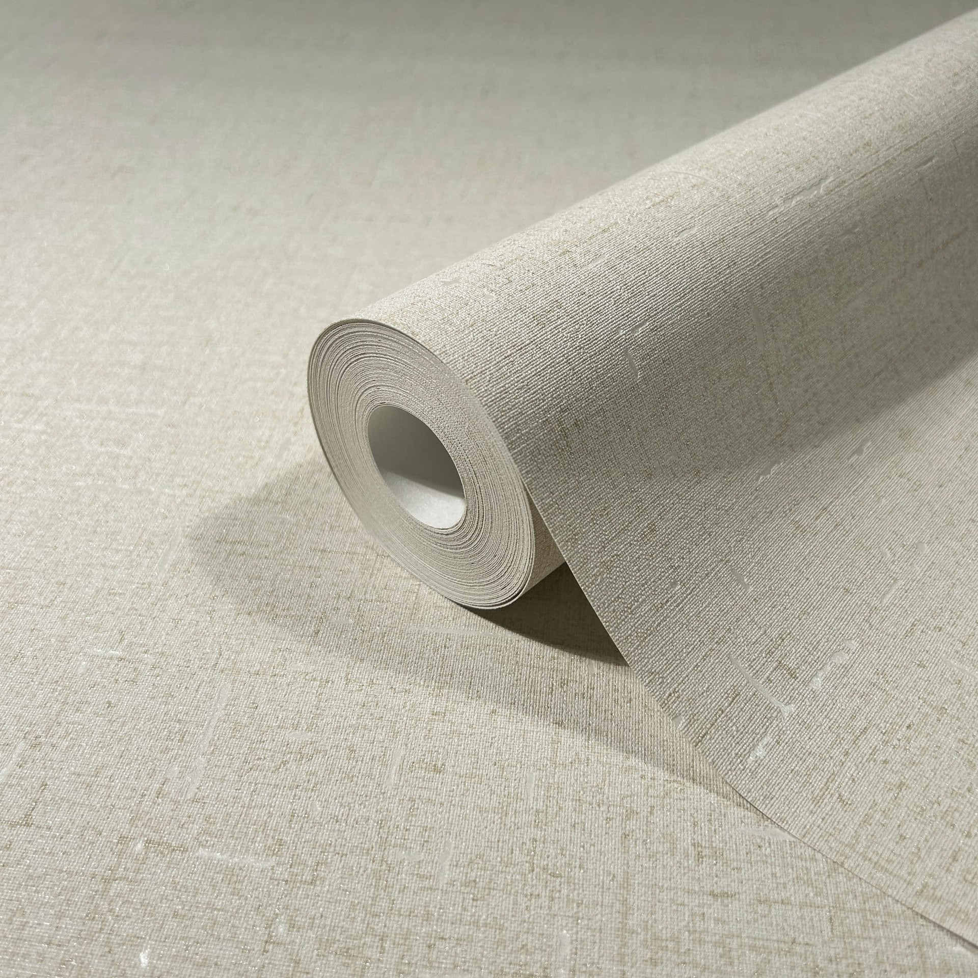 Vliesbehang met licht glanzende beige effen structuur
