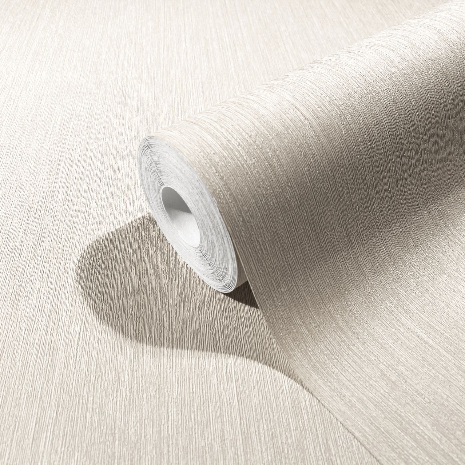 Vliesbehang met fijne lijnen en lichte textuur beige effen