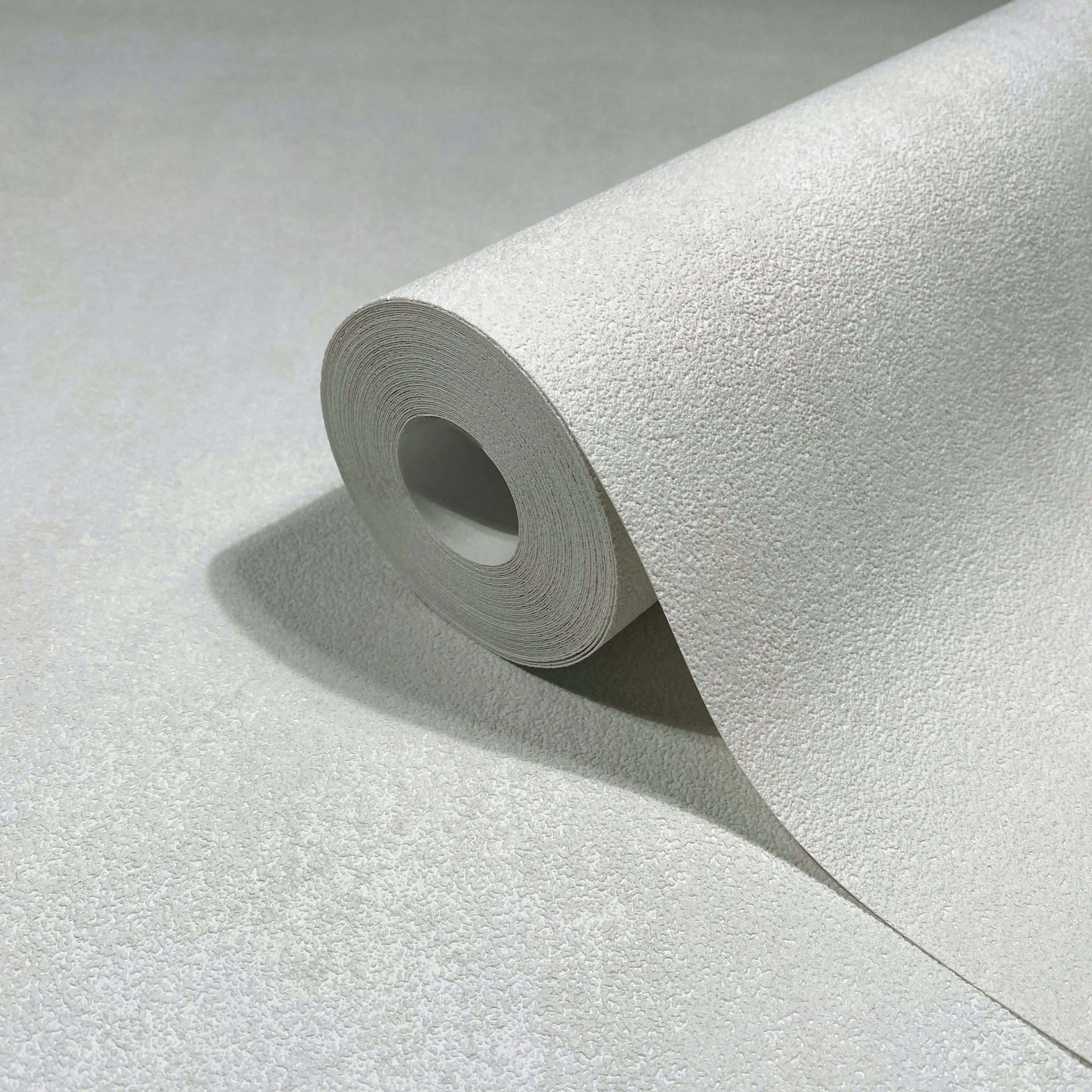 Vliesbehang in grijze betonlook gebruikt look effen