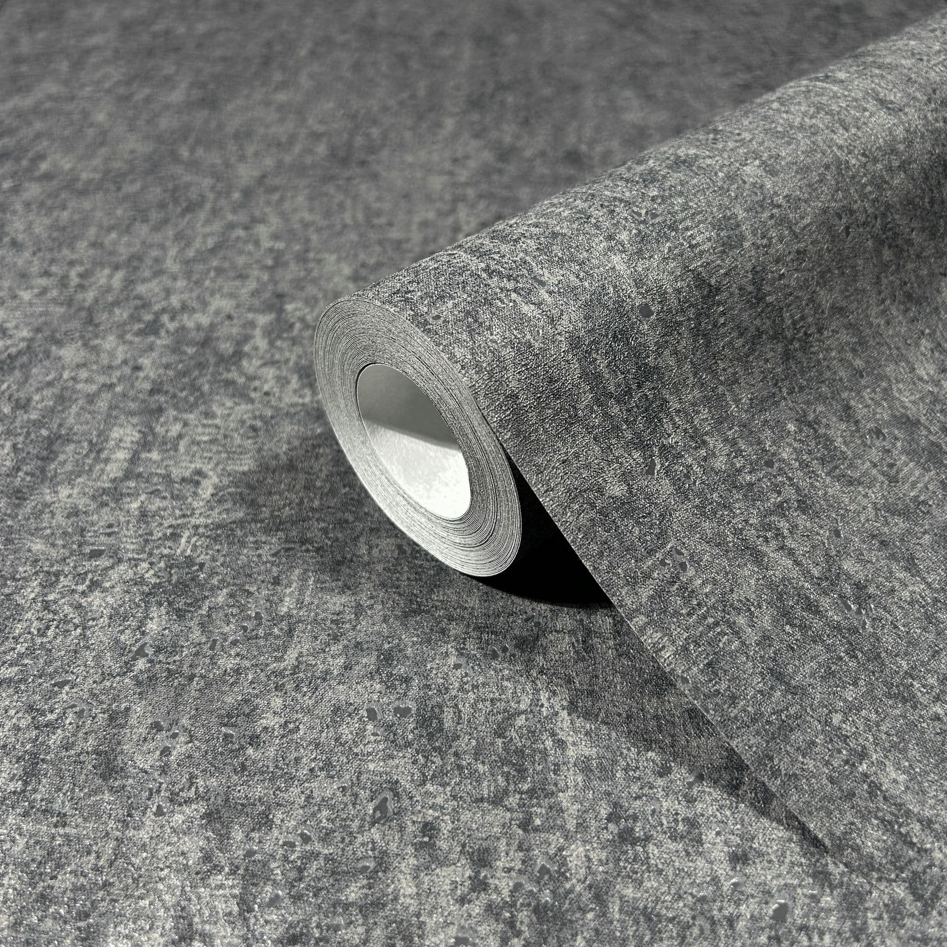 Vliesbehang met matte, lichte structuur antraciet betonlook