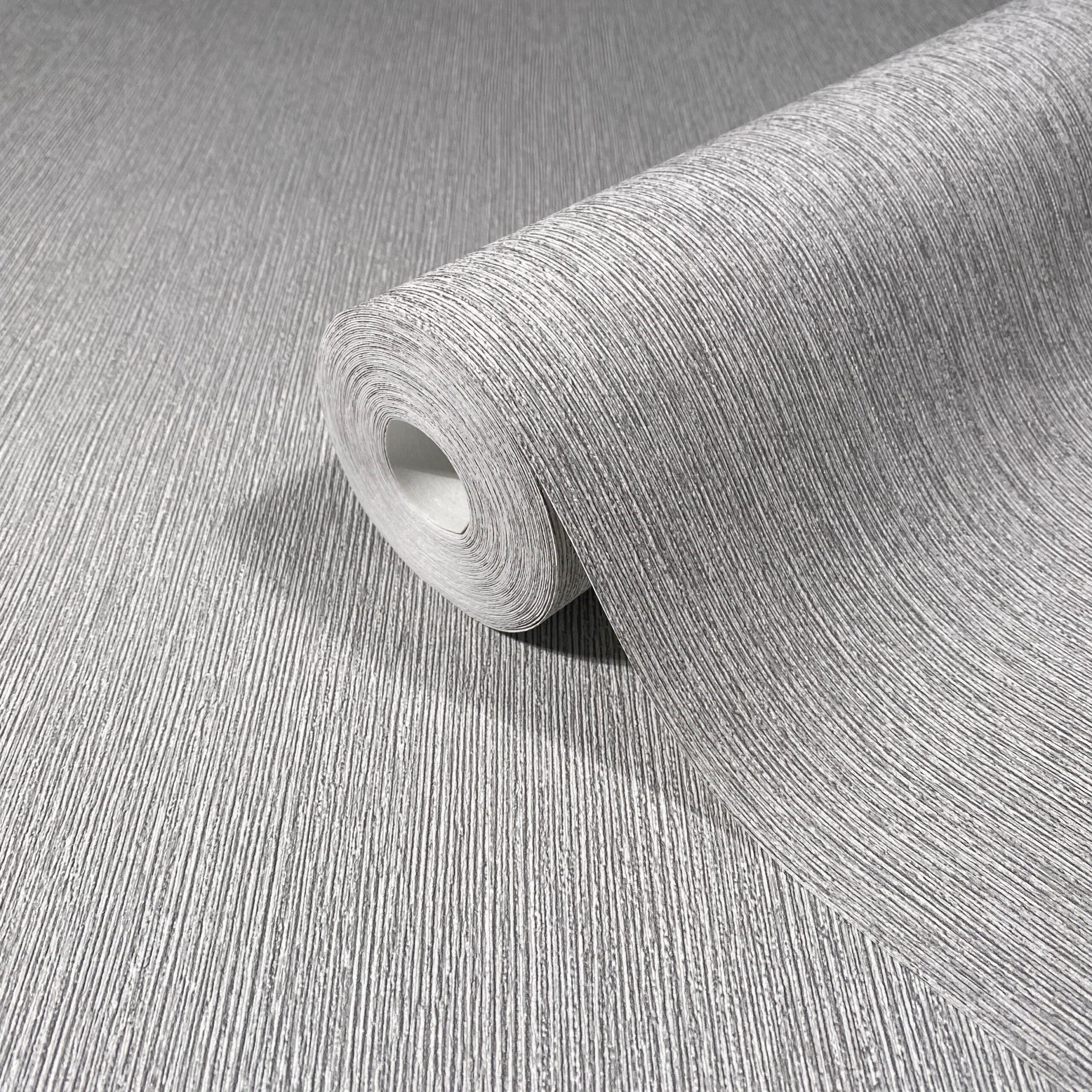 Vliesbehang in textiellook met structuur oppervlak grijs plains
