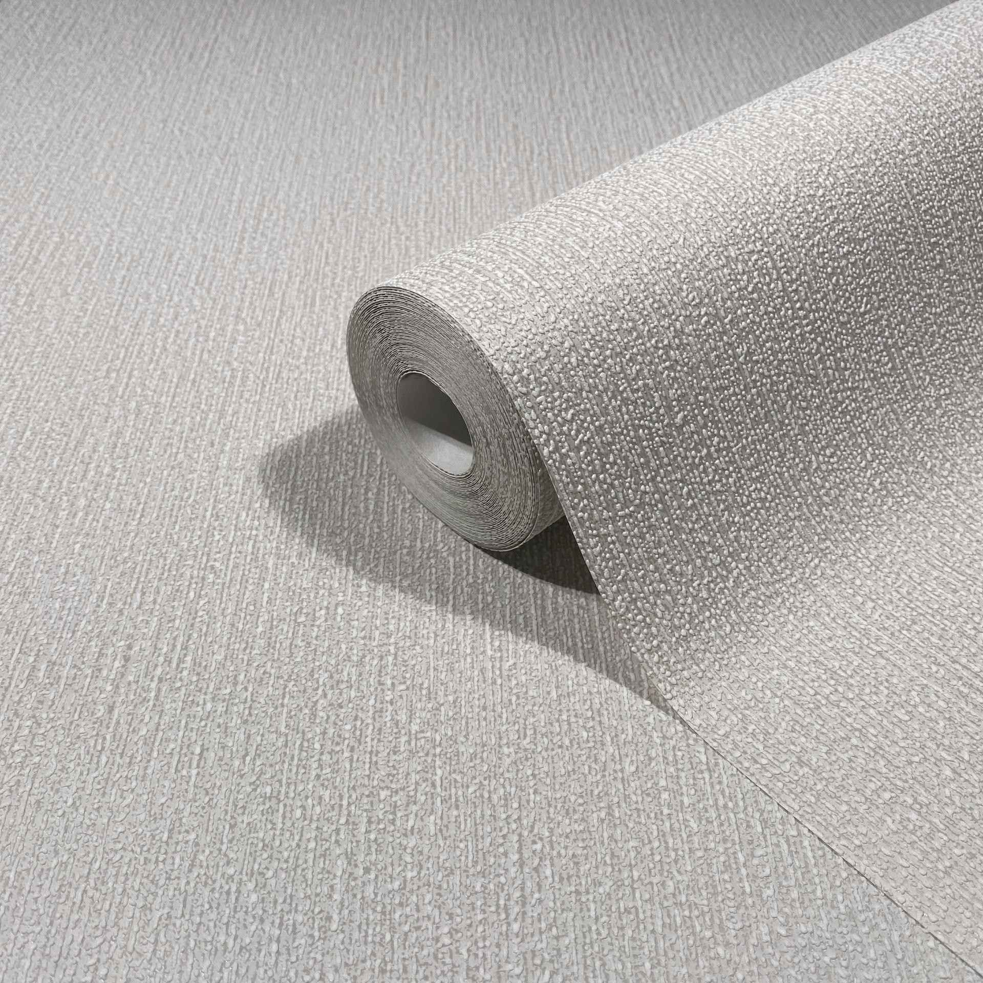 Vliesbehang in beige structuur effen modern