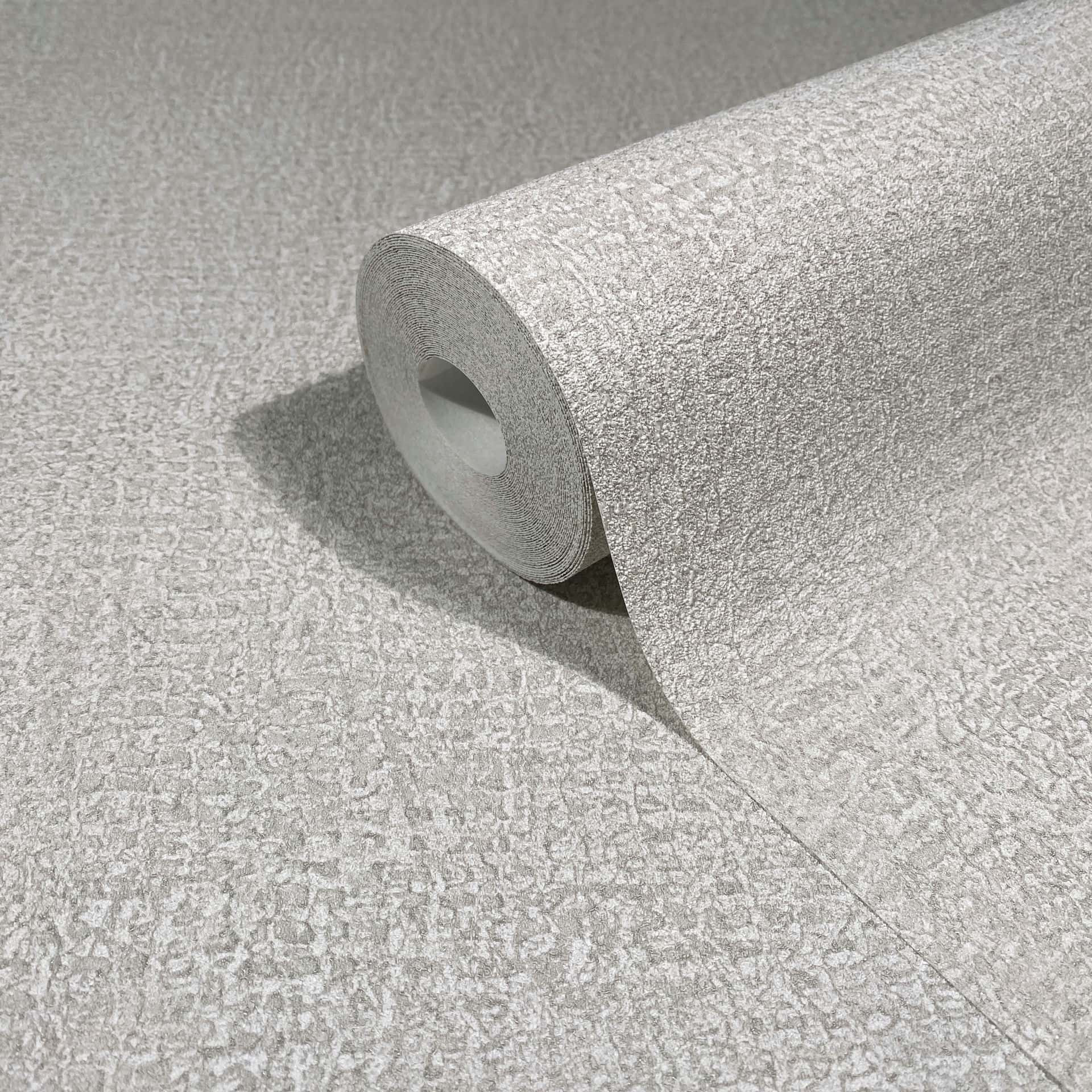 Vliesbehang in grijs, beige structuur gipslook effen