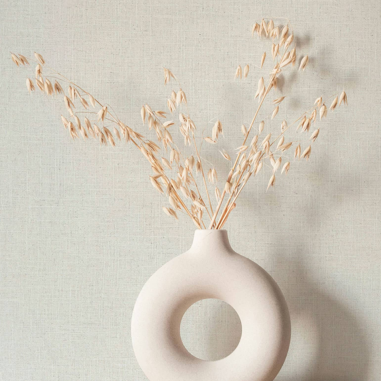 Vliesbehang in textiel effen look beige effen