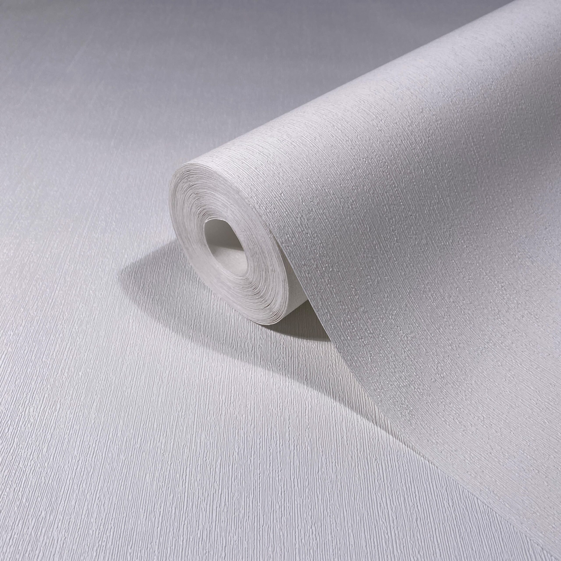 Vliesbehang in textiel look met structuur oppervlak wit plains