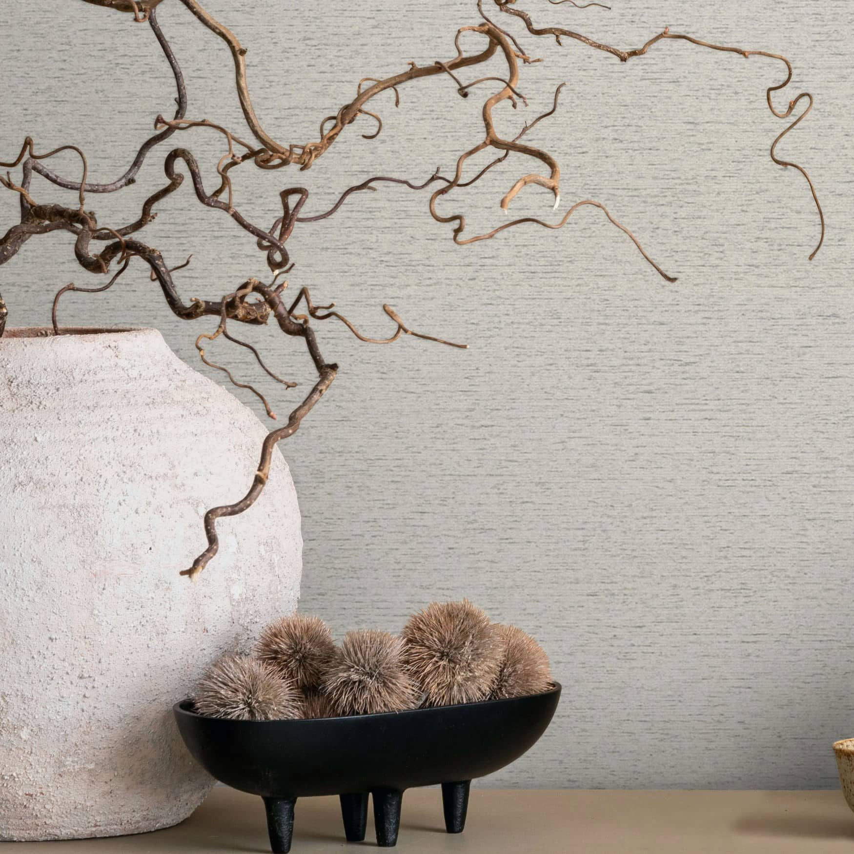 Vliesbehang in een licht gevlekte look als effen grijs, beige structuur