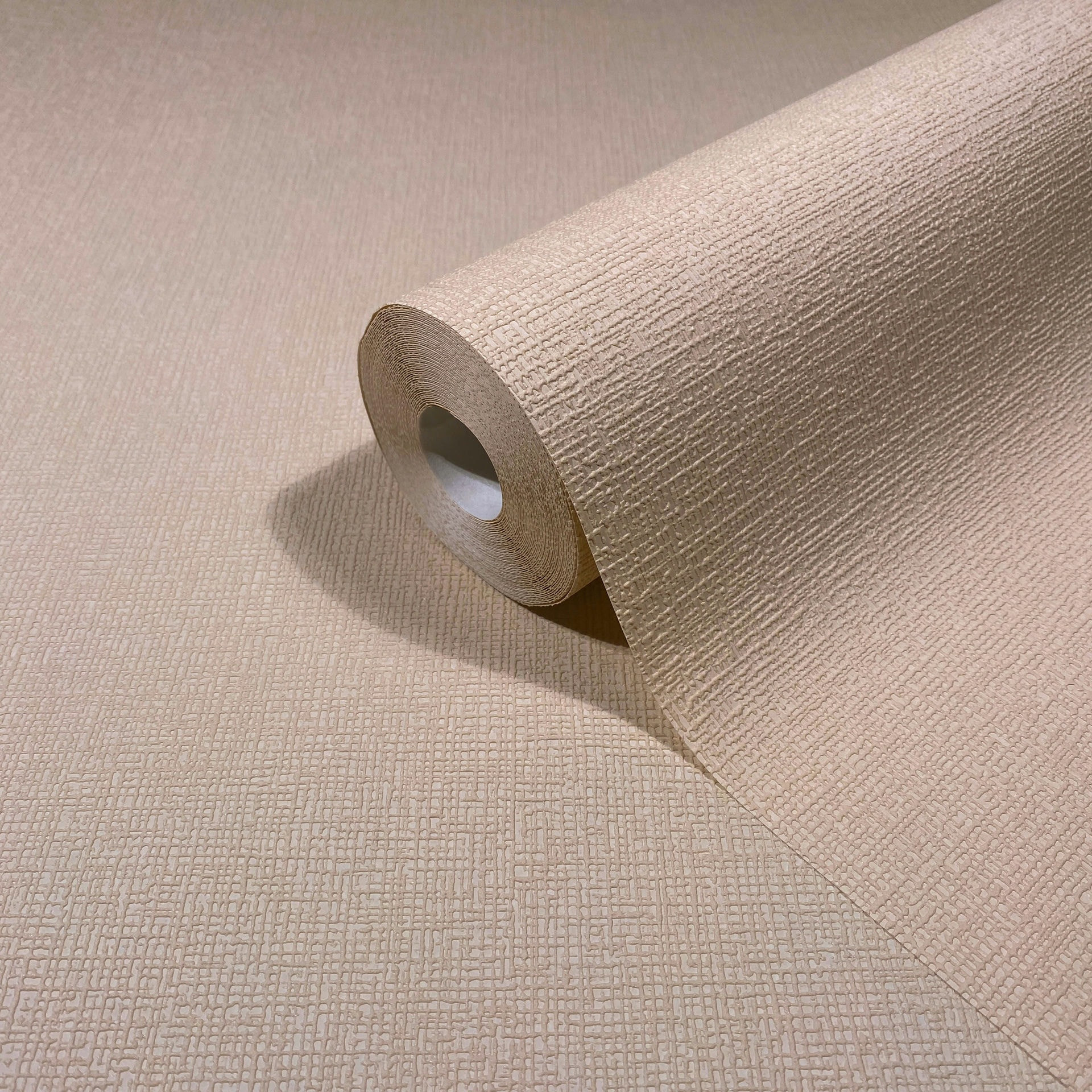Vliesbehang in beige licht structuur effen modern