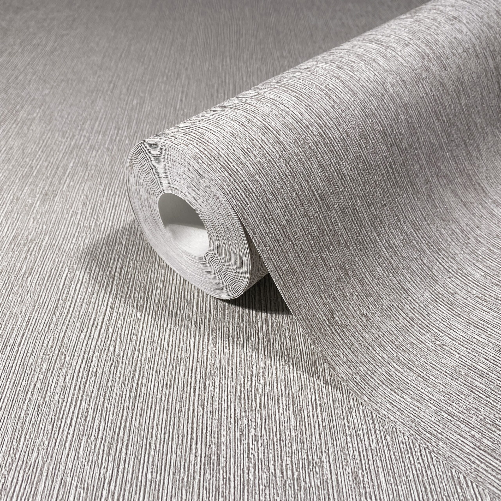 Vliesbehang in textiel look met structuur oppervlak grijs effen