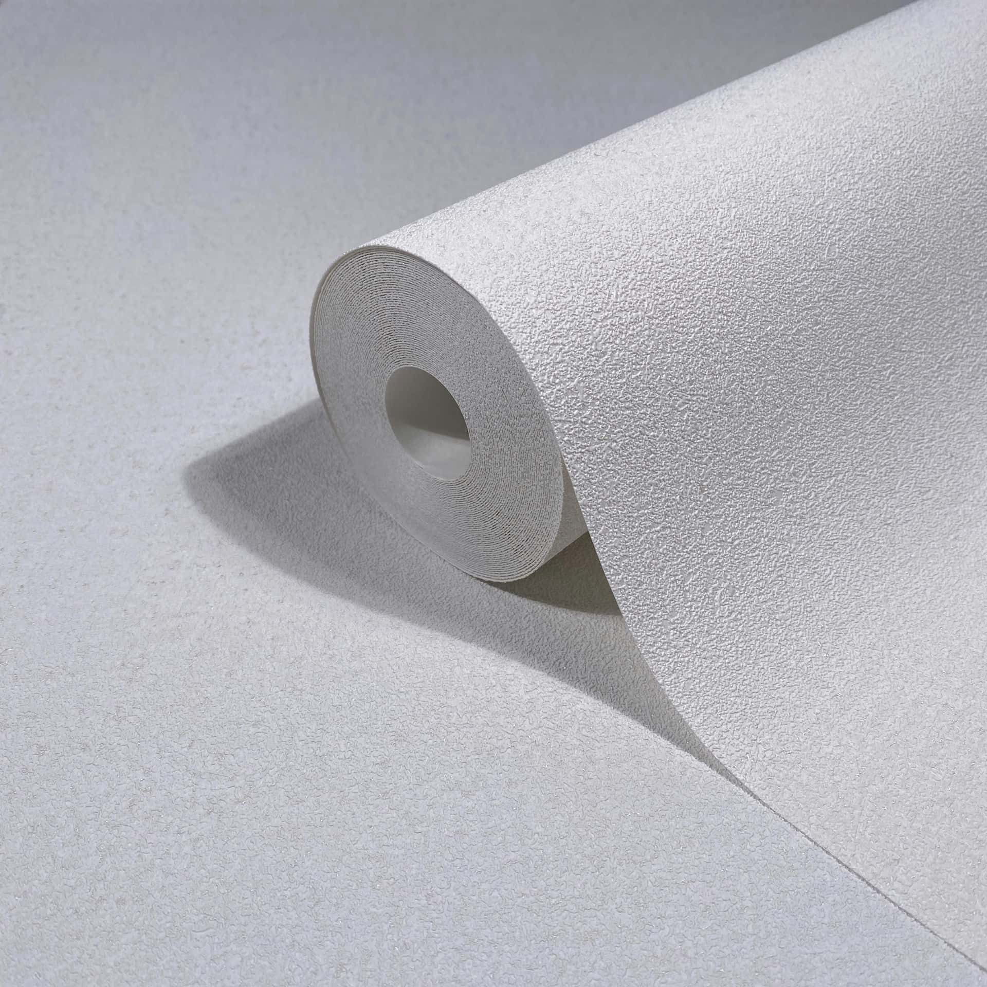 Vliesbehang in witte structuurpleisterlook effen