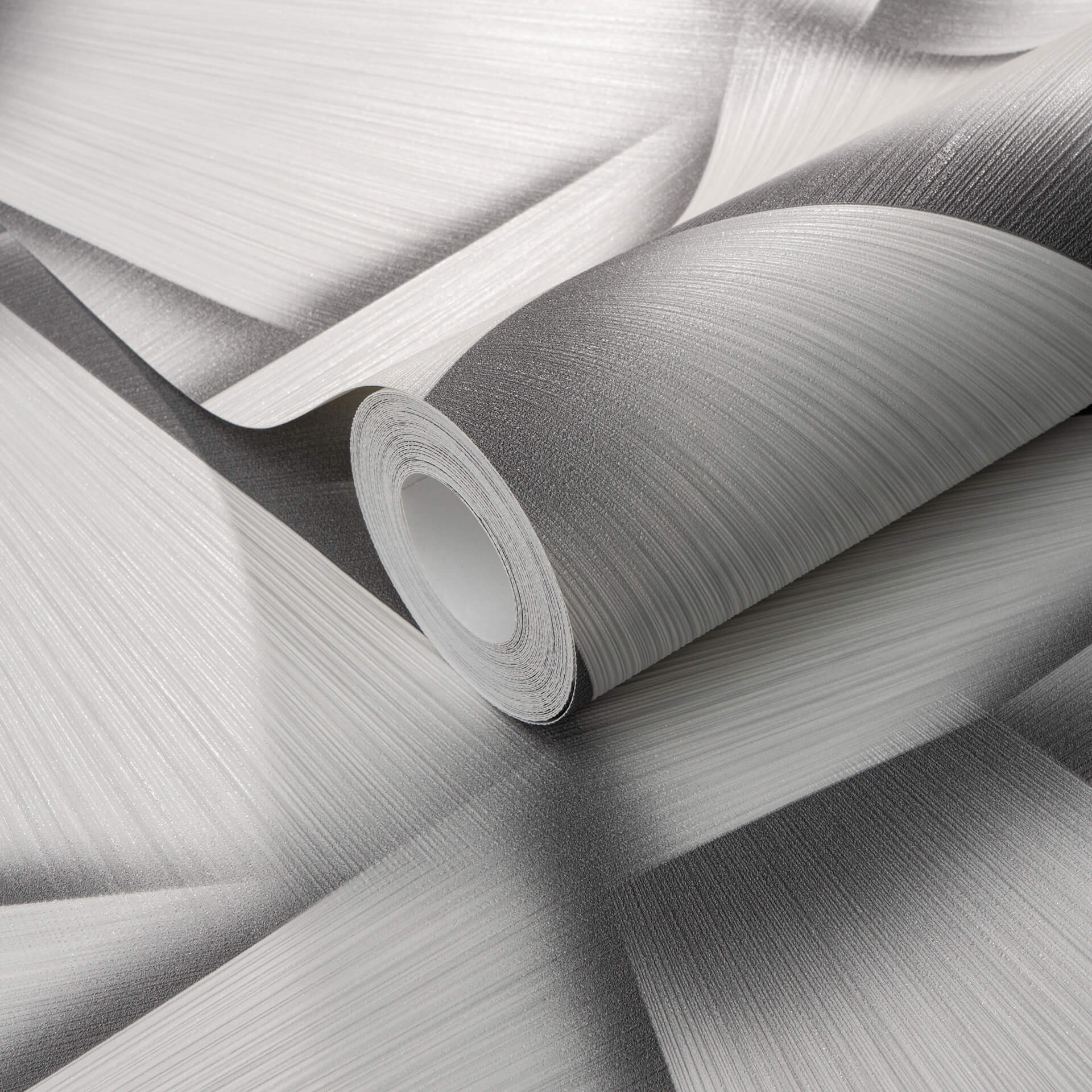 Vliesbehang met geometrische vormen en metallic effect in grijs